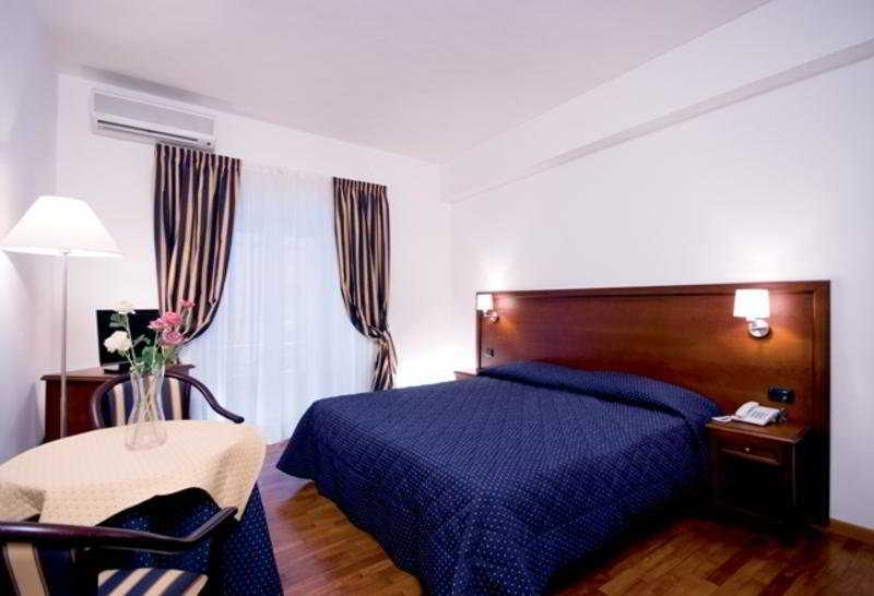 Inn Rome Rooms & Suites Bilik gambar